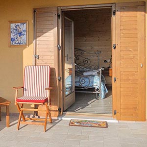 Camera con piscina in agriturismo con vista su Castiglion Fiorentino