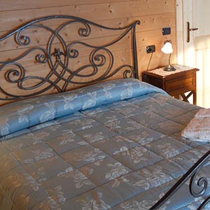 Camera con piscina in agriturismo con vista su Castiglion Fiorentino